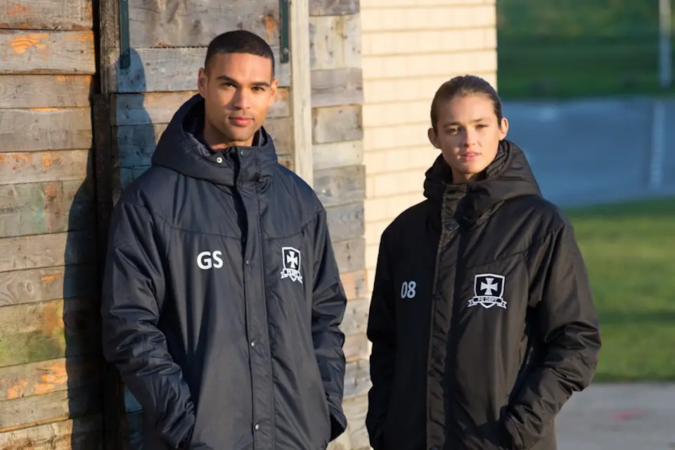 group of youths wearing branded teamwear
