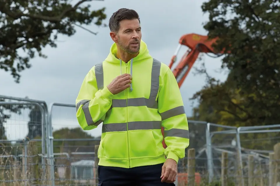 main wearing branded hi vis